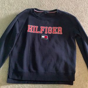 Navy blue women’s Tommy Hilfiger sweatshirt.